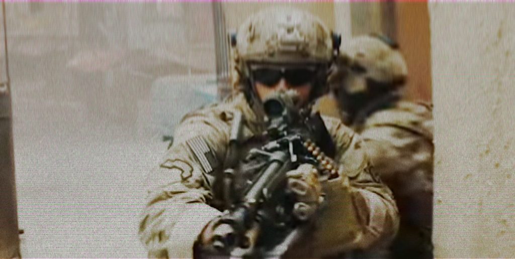 A US Soldier pointing a rifle at the camera from a 2018 US Army ad